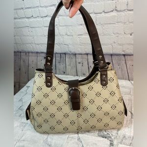 Cute tan and brown faux leather hobo style shoulder purse.